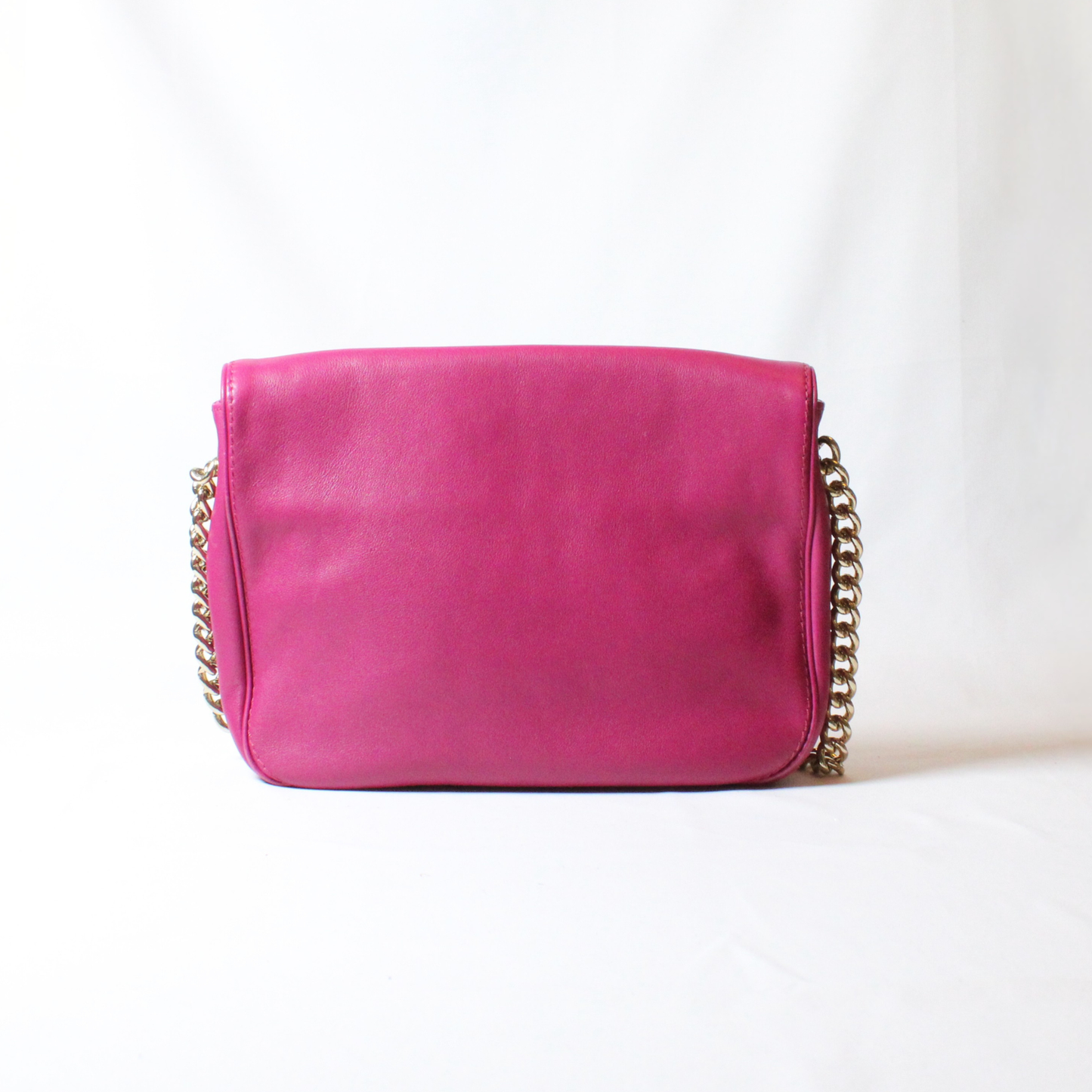 Carolina Herrera magenta leather flap