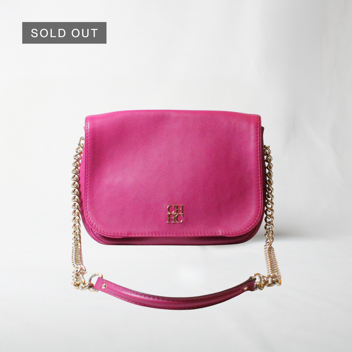 Carolina Herrera magenta leather flap